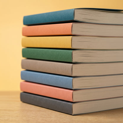 Tiraje corto de libros con encuadernación rústica y lomos de colores — El 78